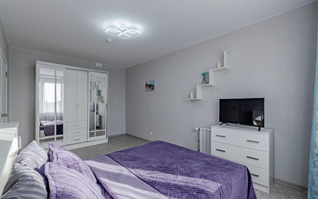 Квартира Уютная квартира в новом современном жилом комплексе