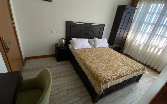 WOO Town Suites