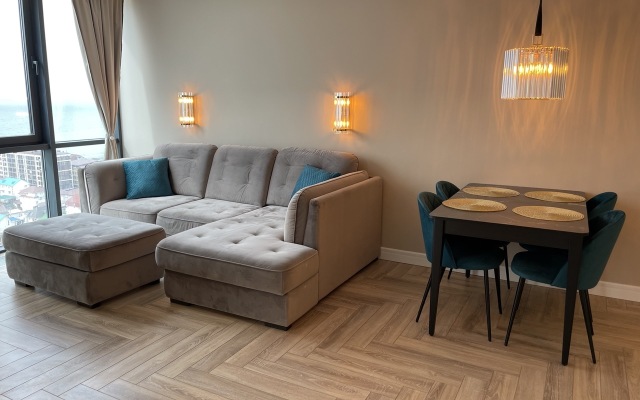 S neveroyatnym vidom na more i zakaty Apartments