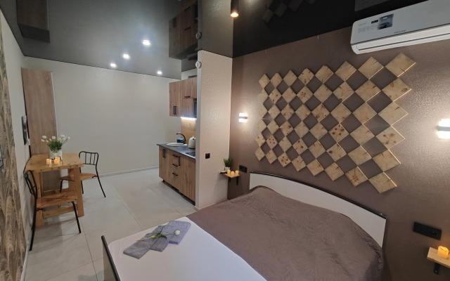 Апартаменты Уютная студия напротив университета и парка в центре Нефтяников