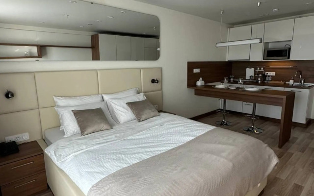 Апартаменты Стильная студия Riva на 21 этаже