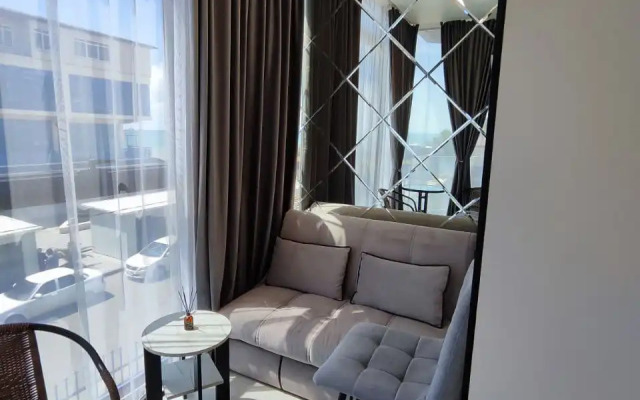 Sovremennye S Lodzhiey Apartments