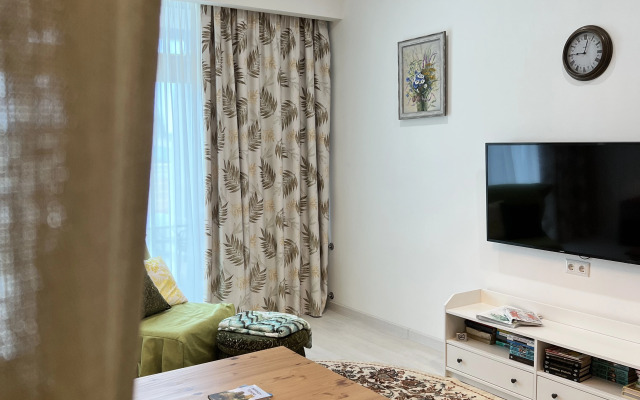 Апартаменты Олива с зоной патио и отдельной спальней