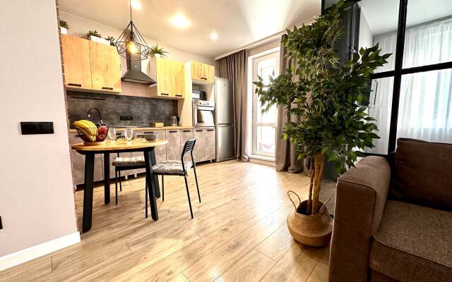 V Novom Dome Flat
