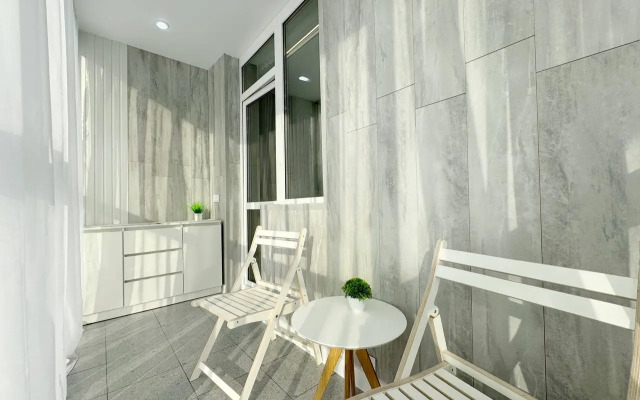 Квартира Уютная студия с панорамной лоджией