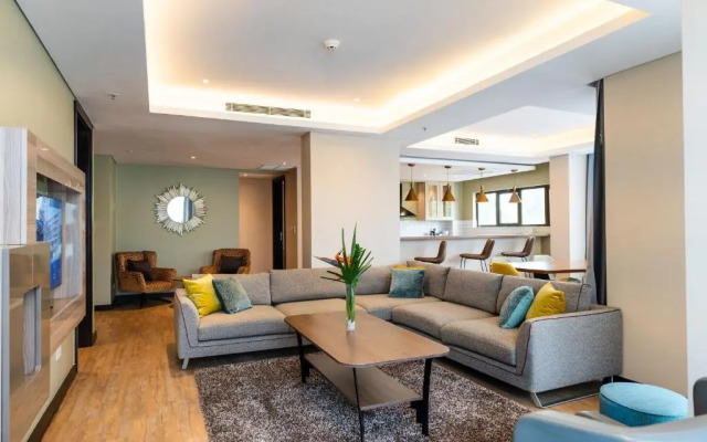 Отель Trademark Suites at Enaki Town