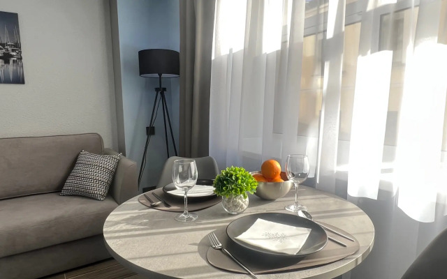 U Chasovoy Bashni Golubye Apartments