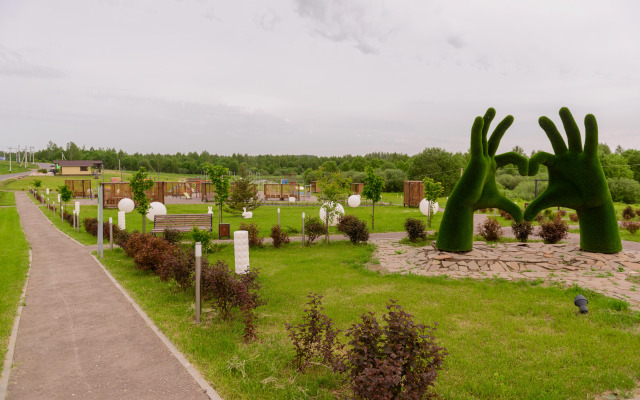 V Poselke U Vodokhranilischa Private house