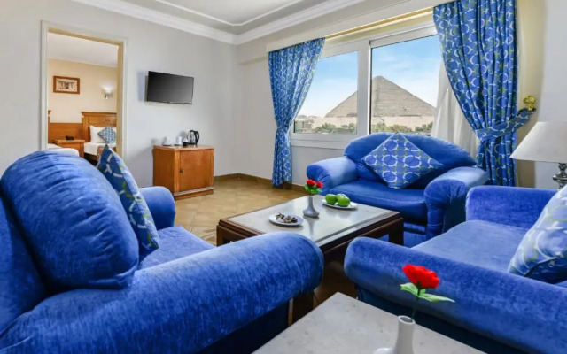 Отель Aura Inn Tiba Pyramids