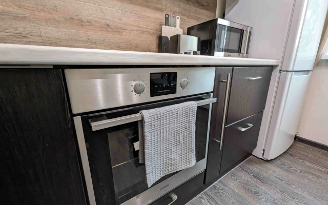 Апартаменты Новые в тихом центре и хвойным лесом за окном