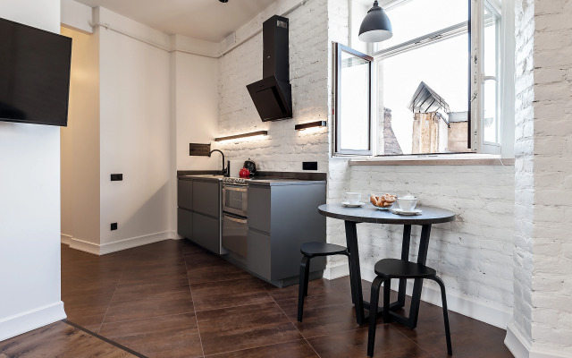 Квартира Элегантный Лофт с видом на крыши