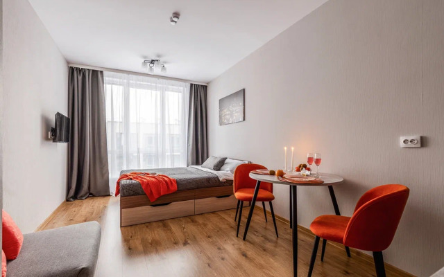 Апартаменты Уютная студия у метро Парнас