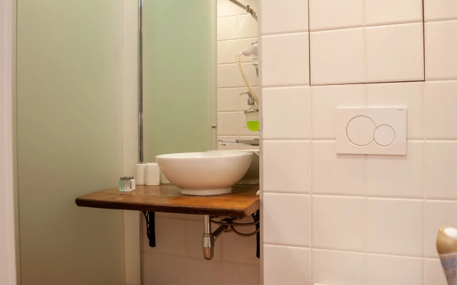 Апартаменты Семейная студия с видом в уютный двор