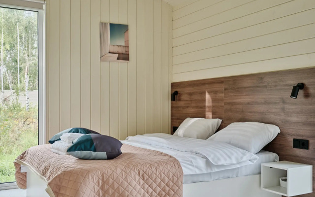 Частный дом с сауной, детской и спортивной площадкой