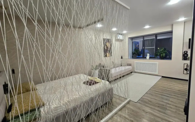 Апартаменты Уютная студия возле Набережной