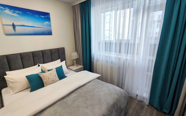 Квартира Enigma Apartments - Студия у набережной в ЖК Аквамарин