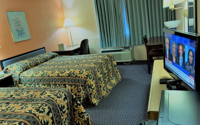 Отель Red carpet Inn & Suites