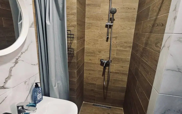 Апартаменты в центре с 1 спальней, кухней-гостиной и балконом