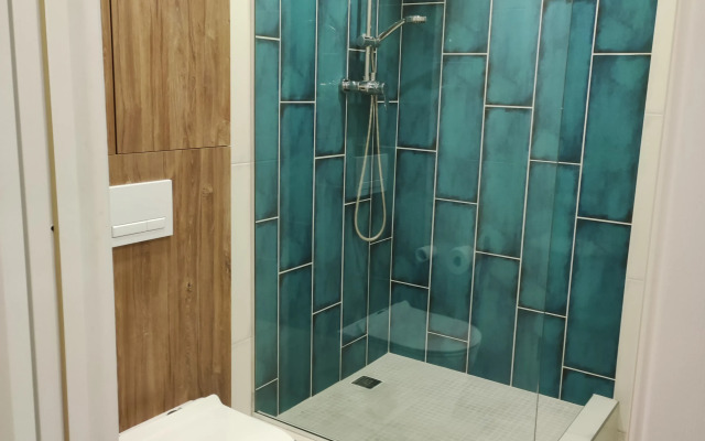 V Tikhom Tsentre Goroda Apartments