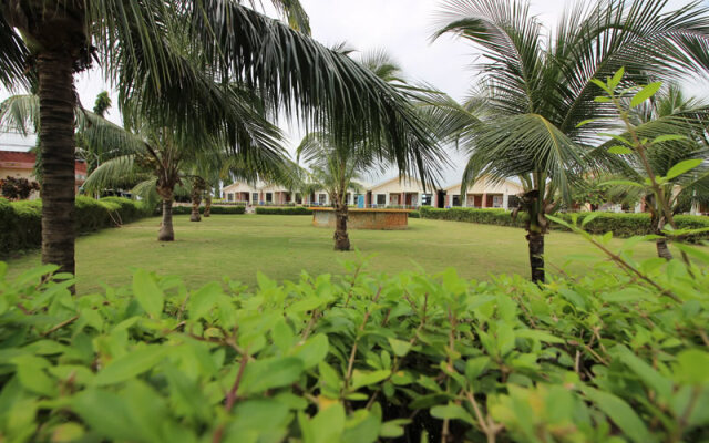 Отель Whispering Palms and Resort