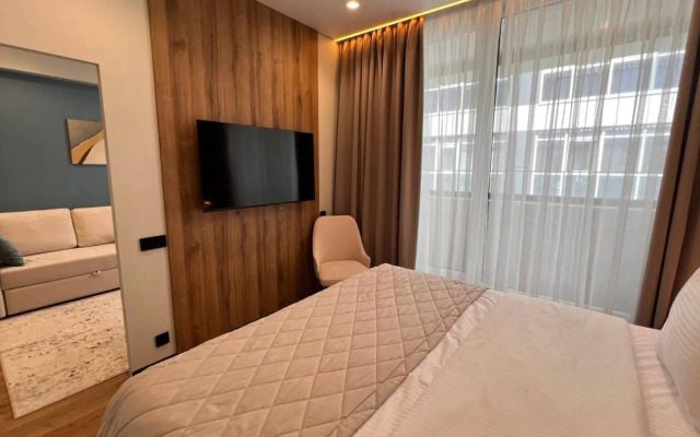 Апартаменты Студия на Учительской 3