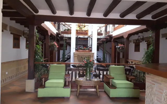 Отель Jardines de la Villa