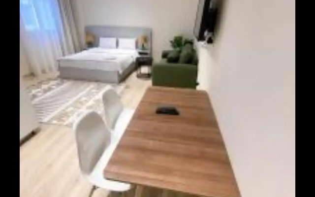 Апарт-отель Settle Inn Banafseg Studio