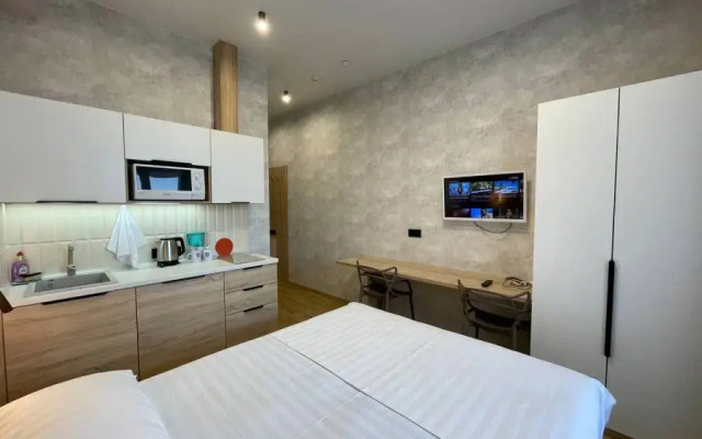 Апартаменты В Гости! на Запорожской 69 (студия 4)