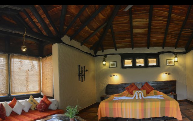 Бунгало Pugdundee Safaris - Kanha Earth Lodge