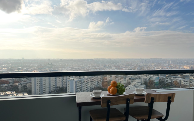 Апартаменты Современная уютная студия с панорамным видом на Ташкент