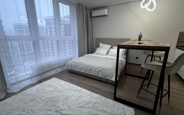 Апартаменты Ваш уголок спокойствия: светлая студия посуточно в спальном районе