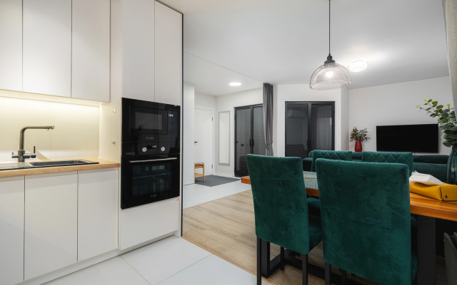 V Tsentre Goroda Flat