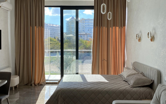 Апартаменты Абсолютно новый апартамент в 50 метрах от моря