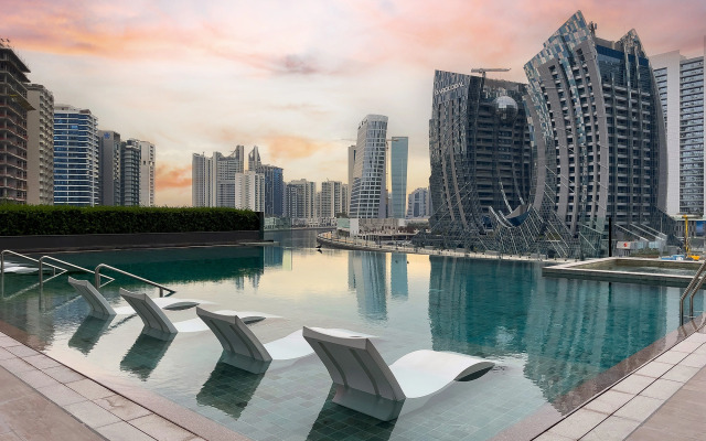 Апартаменты Luxe Waterfront 2BR with Canal & Burj Khalifa view