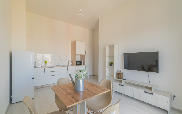 Апартаменты Двухкомнатная Квартира на Мансардном Этаже