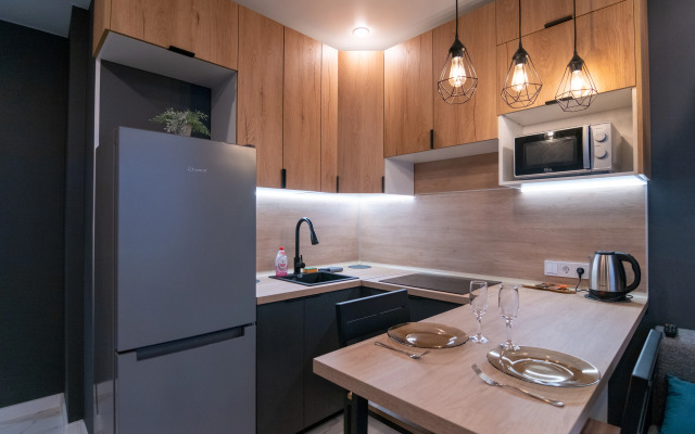 V Novostroye Na Troikh Apartments