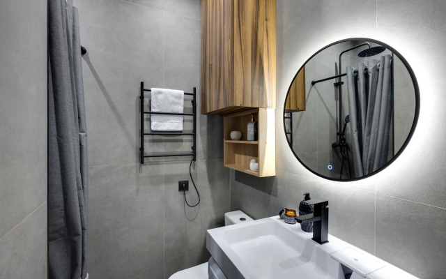 Апартаменты Уютная Студия у Метро Ботанический Сад