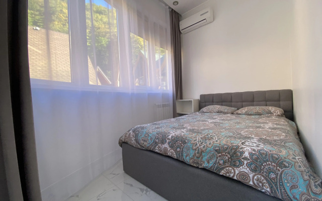 V Tsentre Kurorta S 3 Spalnyami Apartments