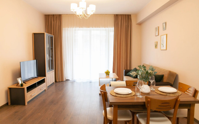 V Komplekse s Chastnoy Parkovkoy Apartments