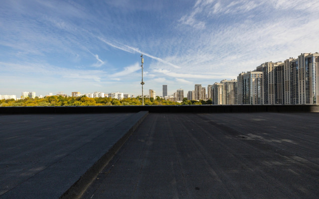 Апартаменты Уютная Студия у Метро Ботанический Сад