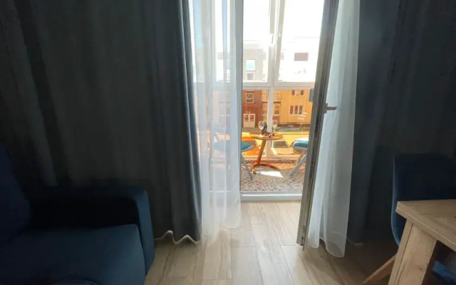 Uyutnaya dlya otdykha na more Flat