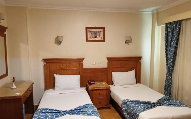 Отель Aura Inn Tiba Pyramids