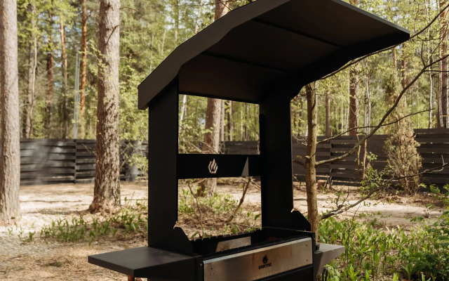 Частный дом Барнхаус в стиле бохо в сосновом лесу