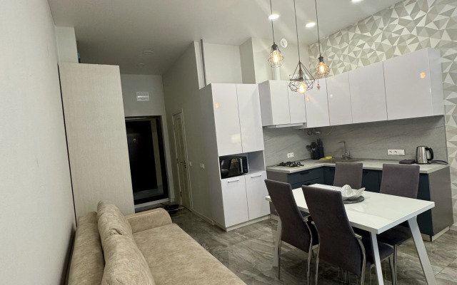 Квартира Просторная студия с террасой напротив отеля Мариотт