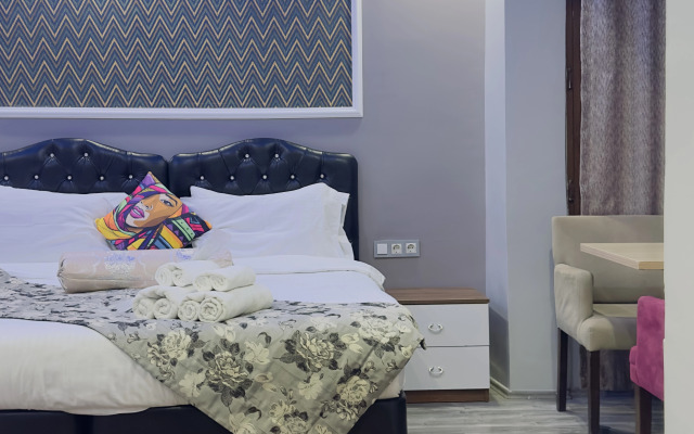 Отель Mitra Downtown