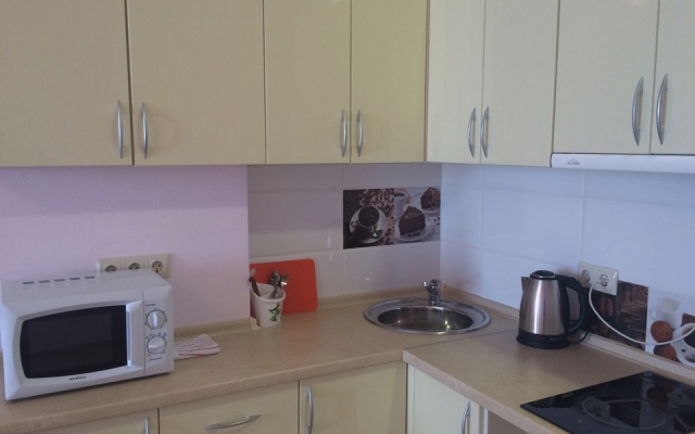 V Tsentre Goroda Apartments