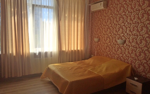 V Tsentre Goroda Apartments