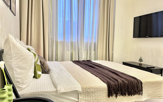 Квартира Свeтлaя Студия в Центрe Гopoдa