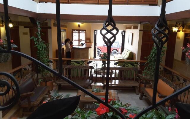 Отель Jardines de la Villa