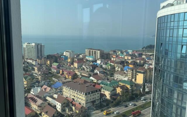 Simfoniya Morskaya-2 s 2 san.uzlami, proektorom na balkone, bassejnom na territorii Apartments